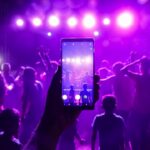 India Shazam chart week - DJ night crowd at an Indian wedding celebrating with music and lights