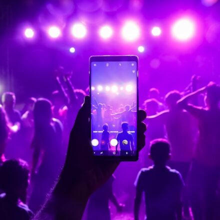 India Shazam chart week - DJ night crowd at an Indian wedding celebrating with music and lights
