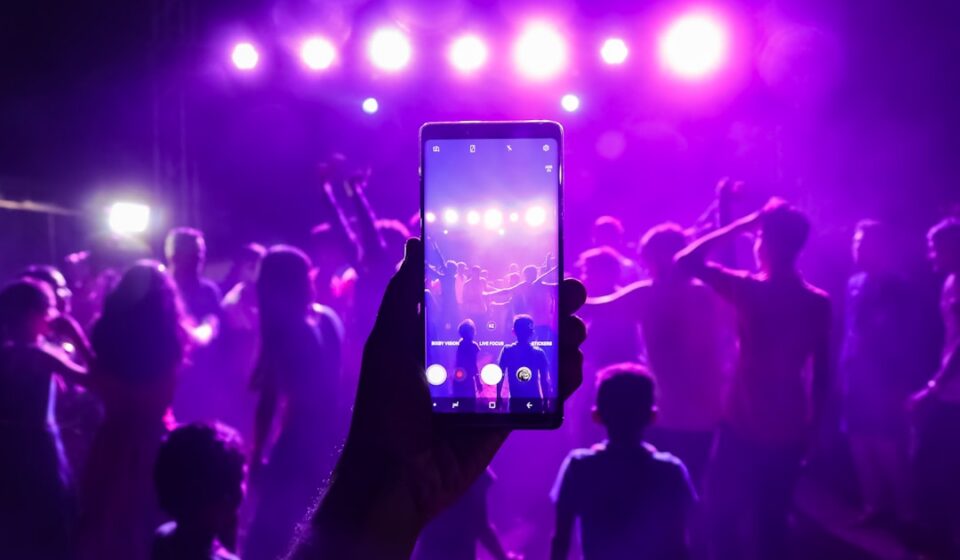 India Shazam chart week - DJ night crowd at an Indian wedding celebrating with music and lights