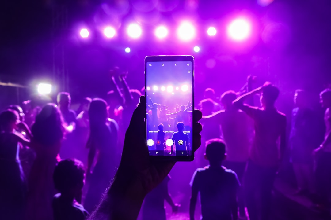 India Shazam chart week - DJ night crowd at an Indian wedding celebrating with music and lights