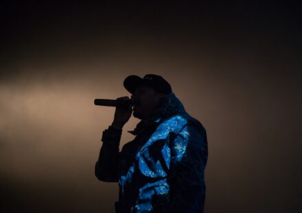 tricksingh performing on stage – hip hop artist spotlight silhouette